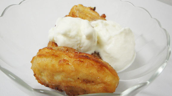 Banana fritters served with ice cream