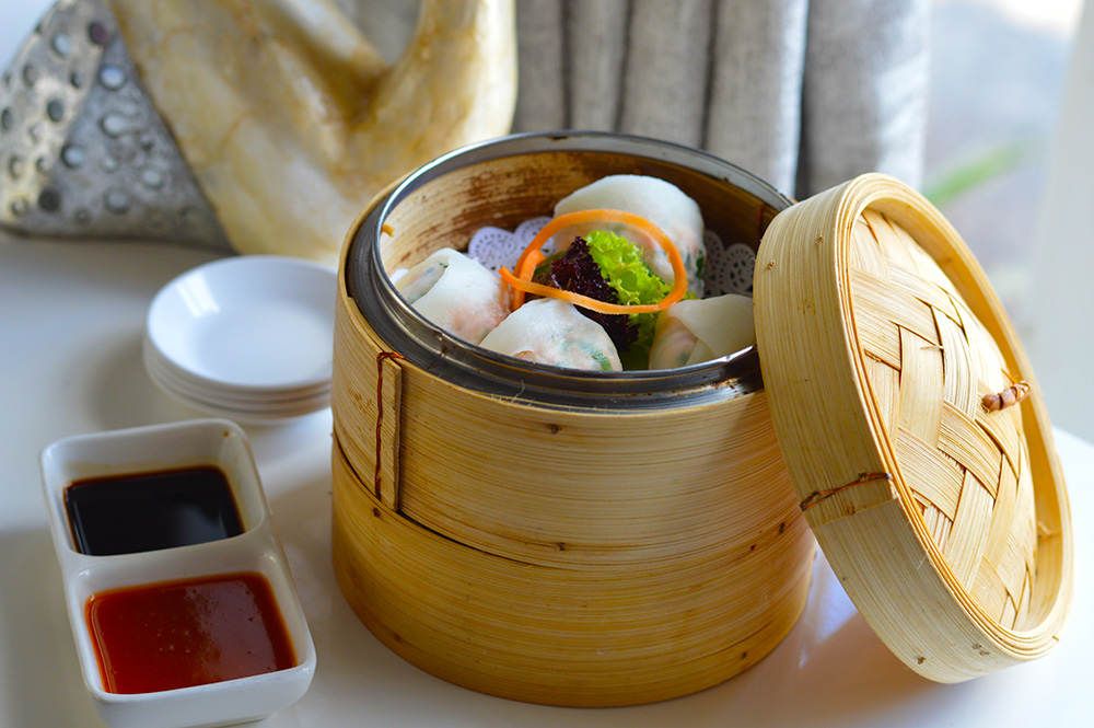 Dim sum with soy sauce and sweet chilli sauce